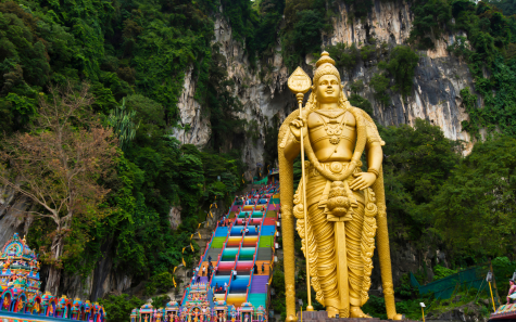 Batu Caves Murugan statue Malaysia tour packages from Hyderabad for cultural and temple sightseeing trips.
